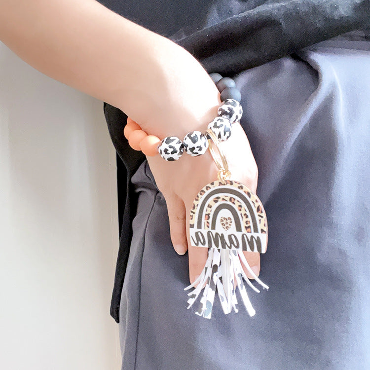 Wholesale Lacquer Round Beads Cow Pattern Wooden Beads Rainbow Wooden Sign Tassel Bracelet Keychain